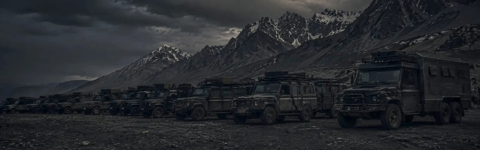 Overland vehicles gathered at a remote meeting point